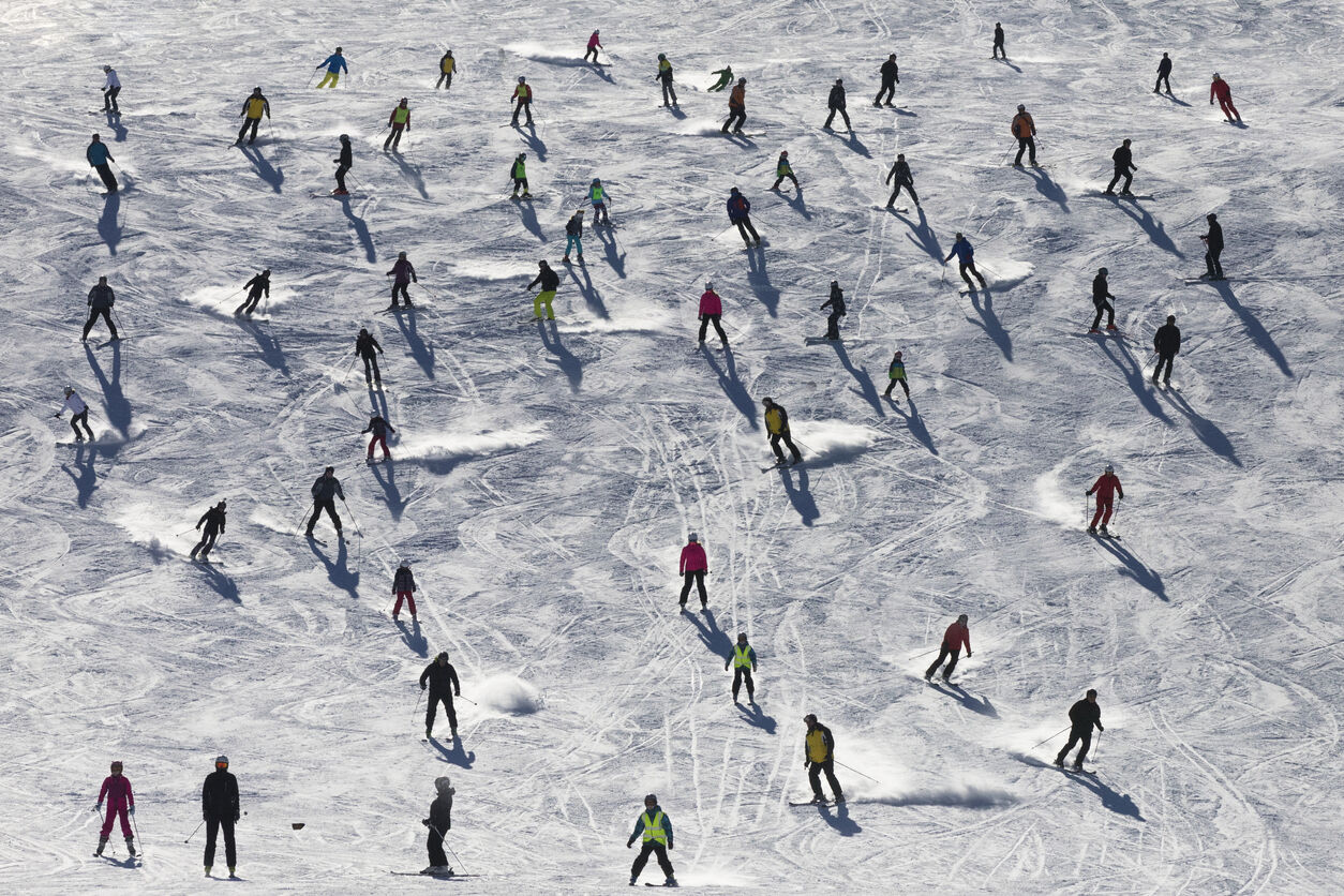 Hopelessly crowded Ski slope DieterMeyrl (iStock)